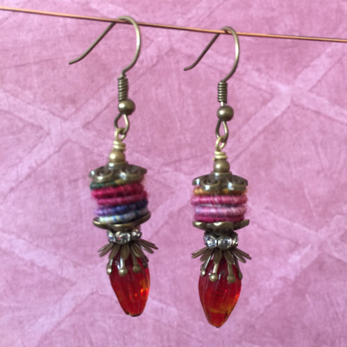 Maroon Glass Blossom with Red Fiber Bead