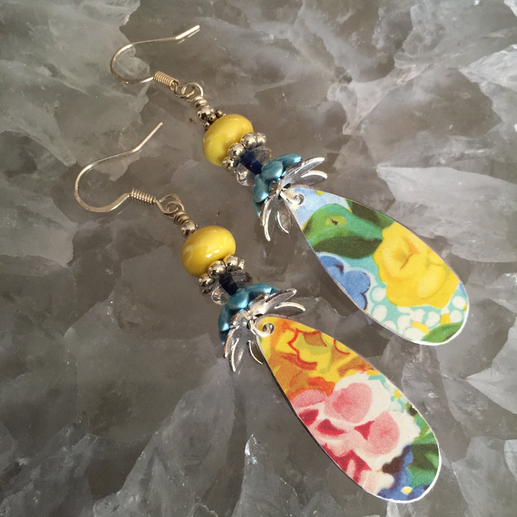 Yellow and Blue Ceramic Beads on Elongated Tear Drop Spring Floral Tin